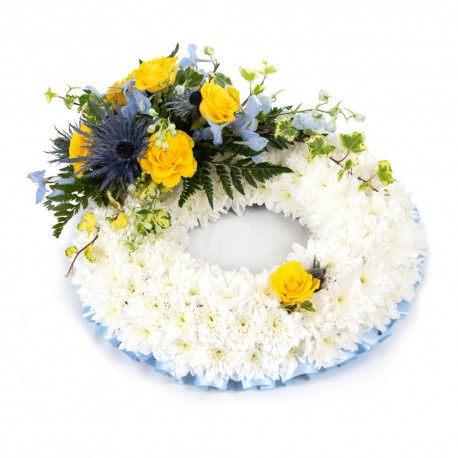 White based Wreath with yellow top spray SYM-319